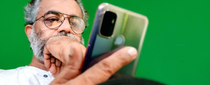 old man on iphone financing