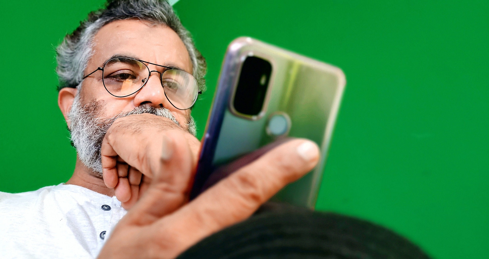 old man on iphone financing